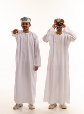 Omani Men in Traditional Dress with Binoculars