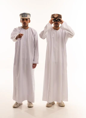 Omani Men in Traditional Dress with Binoculars