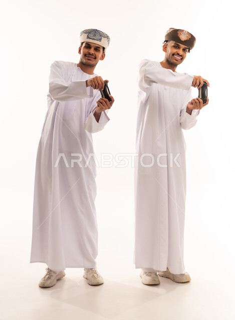 Omani Men Playing Video Games on White Background
