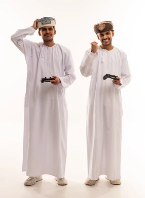 Omani Men Playing Video Games on White Background