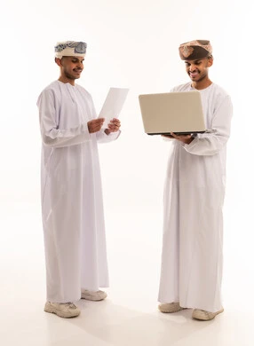 Omani Men with Laptop and Documents in Studio