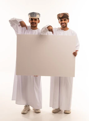 Omani Men Holding Blank White Board in Studio