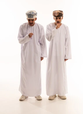 Omani Men in Traditional Dress Coughing in Studio