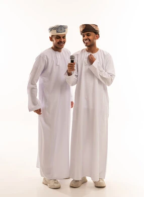 Omani Men in Traditional Dress with Microphone Studio
