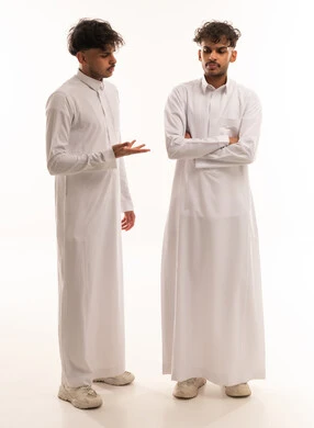 Saudi Men in Traditional Thobe Having an Argument