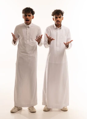 Two Shocked Saudi Men in White Thobe on White Background
