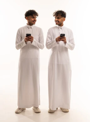 Saudi Men in Thobes with Smartphones in Studio