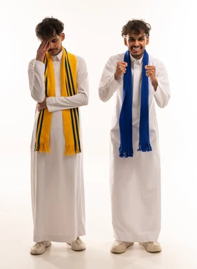 Saudi Football Fans Celebrating and Losing on White