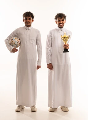 Saudi Men in Thobes with Soccer Ball and Trophy
