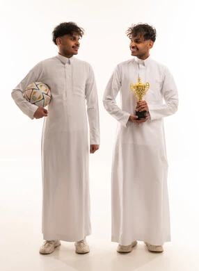 Saudi Men with Football and Gold Trophy