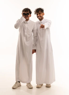 Two Saudi Men in Traditional Thobe with Binoculars
