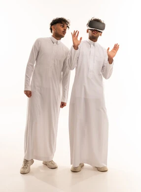Saudi Men Using VR Headset on White Background
