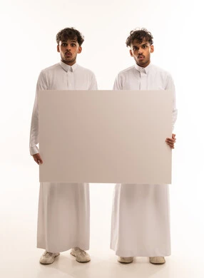 Saudi Men Holding Blank White Placard with Surprised Faces