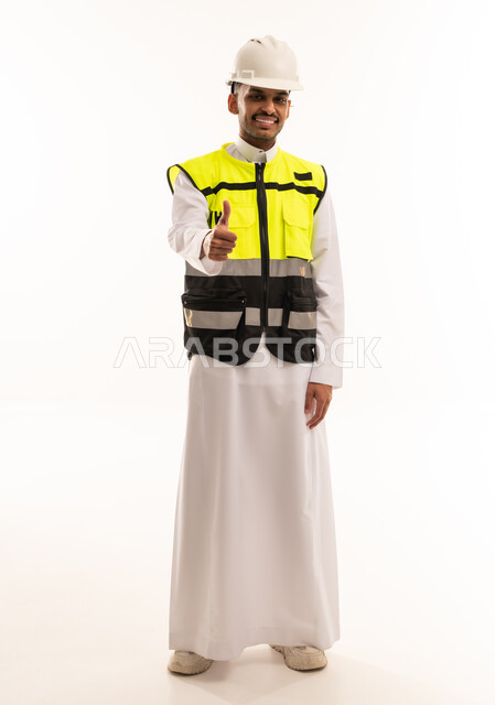 Saudi Engineer in Safety Vest with Thumbs Up Gesture