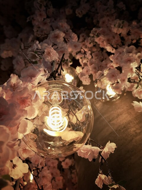 Creative image of a light surrounded by roses, occasions and weddings, Valentine, beautiful fragrant roses, beautiful scenery