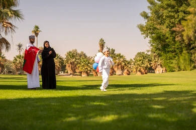 Omani Family Celebrating National Day in Green Park