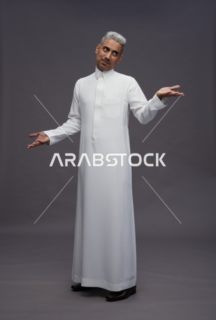 Saudi Man in White Thobe with Confused Gesture