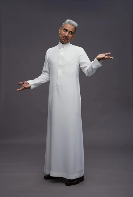 Saudi Man in White Thobe with Confused Gesture