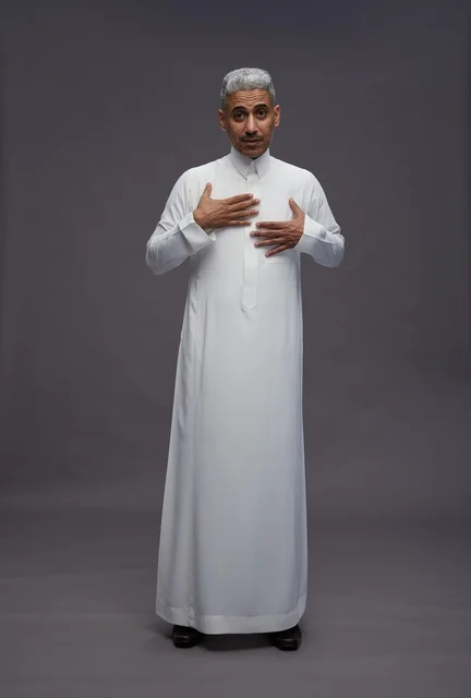 Saudi Man in White Thobe on Grey Background