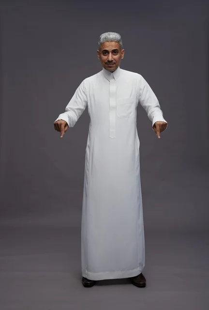 Saudi Man in White Thobe Pointing Down on Grey Background