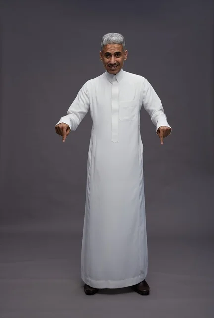 Saudi Man in White Thobe Pointing Down on Grey Background