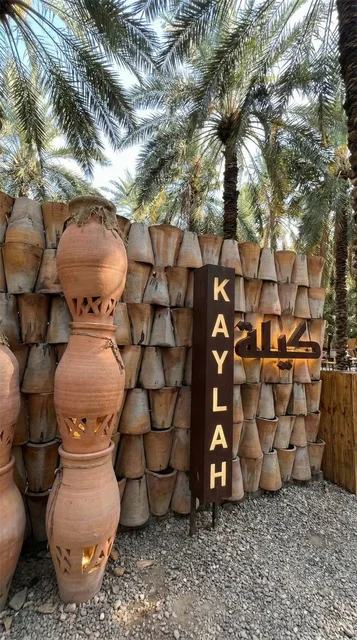 Kaylah Sign at Palm Oasis Farm Pottery Wall