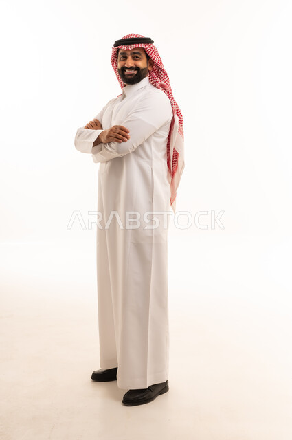 Smiling Saudi Man in Traditional Thobe and Shemagh
