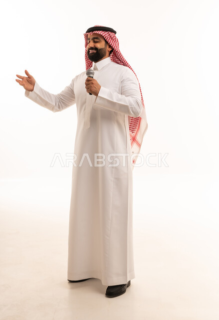 Saudi Man Singing with Microphone in Studio