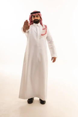 Saudi Man in Traditional Thobe Making Stop Gesture