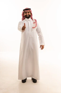 Saudi Man in Traditional Thobe Giving Thumbs Up