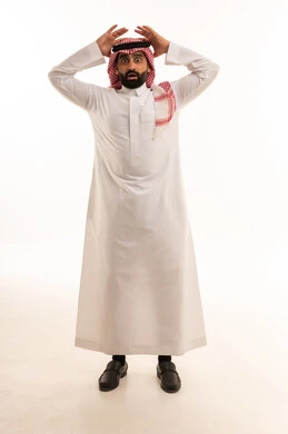 Shocked Saudi Man in Traditional Thobe and Shemagh