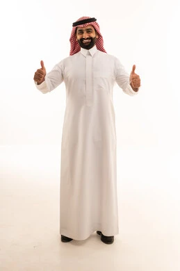 Saudi Man in Traditional Thobe Giving Thumbs Up Gesture