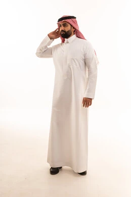 Saudi Man in Traditional Thobe Listening Intently