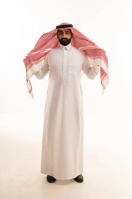Saudi Man in Traditional Dress on White Background