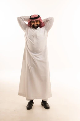 Saudi Man in Traditional Thobe Smiling in Studio
