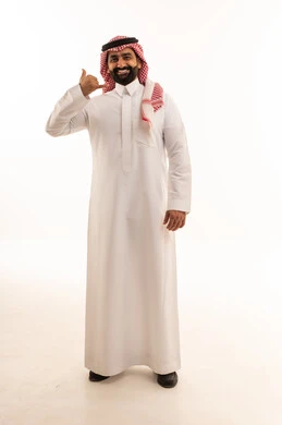 Saudi Man in Thobe Making Call Me Hand Gesture