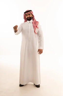 Saudi Man in Traditional Thobe Making Hand Gesture
