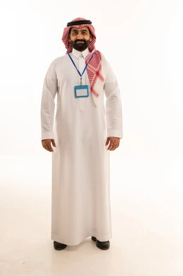 Saudi Man in Traditional Thobe with ID Badge