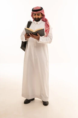 Saudi Man Reading Book with Backpack White Background