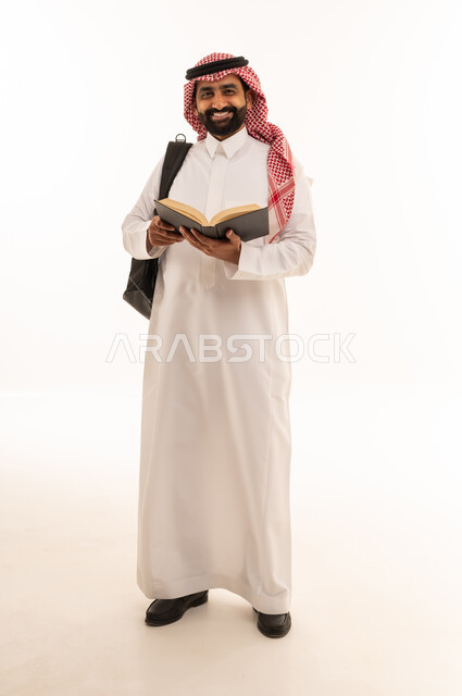 Saudi Male Student with Book and Backpack on White
