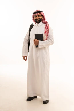 Saudi Businessman in Traditional Thobe with Tablet