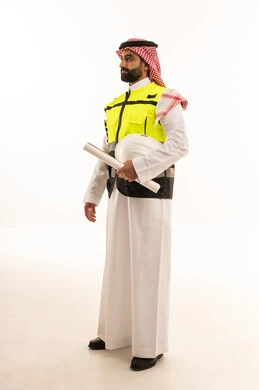 Saudi Male Engineer with Blueprints on White Background