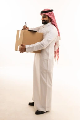 Saudi Man Signing for Delivery Parcel White Background