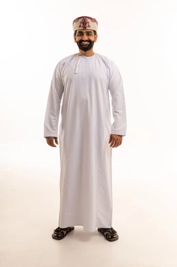 Omani Man in Traditional White Dishdasha and Kumma Portrait