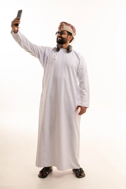 Omani Man Taking Selfie in Traditional Dress