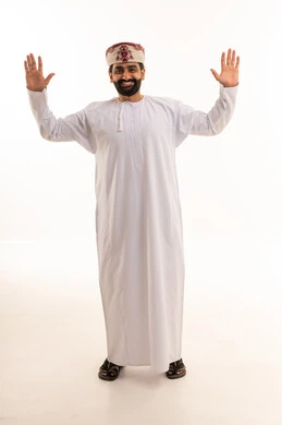 Omani Man in Traditional Dishdasha with Hands Raised