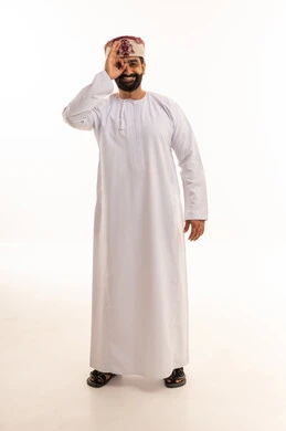 Omani Man in Traditional Dress Making Okay Gesture