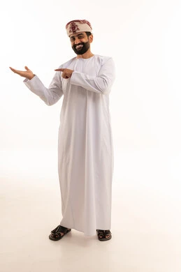 Omani Man in Traditional Dress Pointing to Palm
