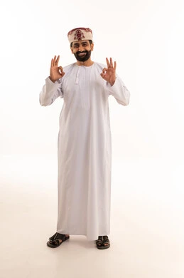Omani Man in Traditional Dress Making OK Hand Gesture