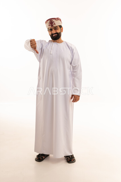 Omani Man in Traditional Dishdasha Thumbs Down